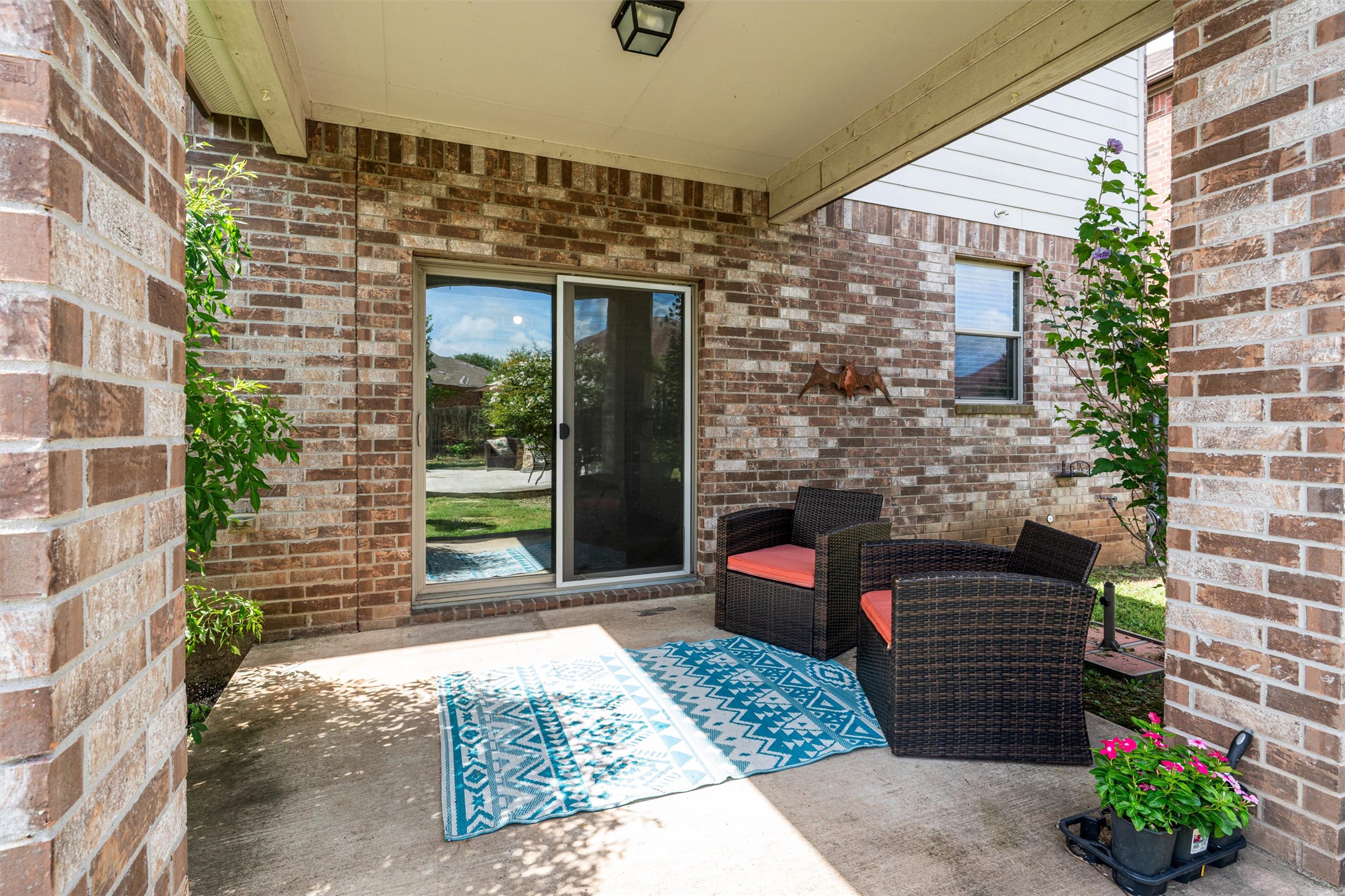 804 Water Hyacinth Loop Leander, TX 78641 - Photo 29 of 39 The covered patio offers a shaded, comfortable space to relax outdoors—perfect for morning coffee, evening unwinding, or weekend grilling.