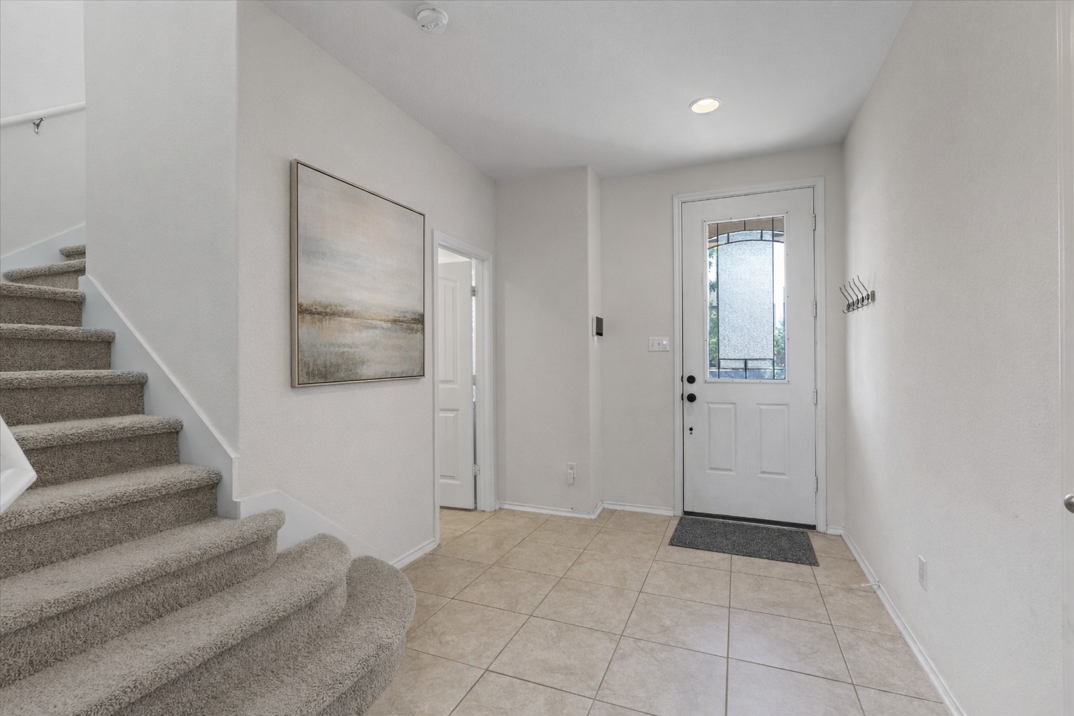 804 Water Hyacinth Loop Leander, TX 78641 - Photo 3 of 39 Virtually staged entry way with neutral colors.