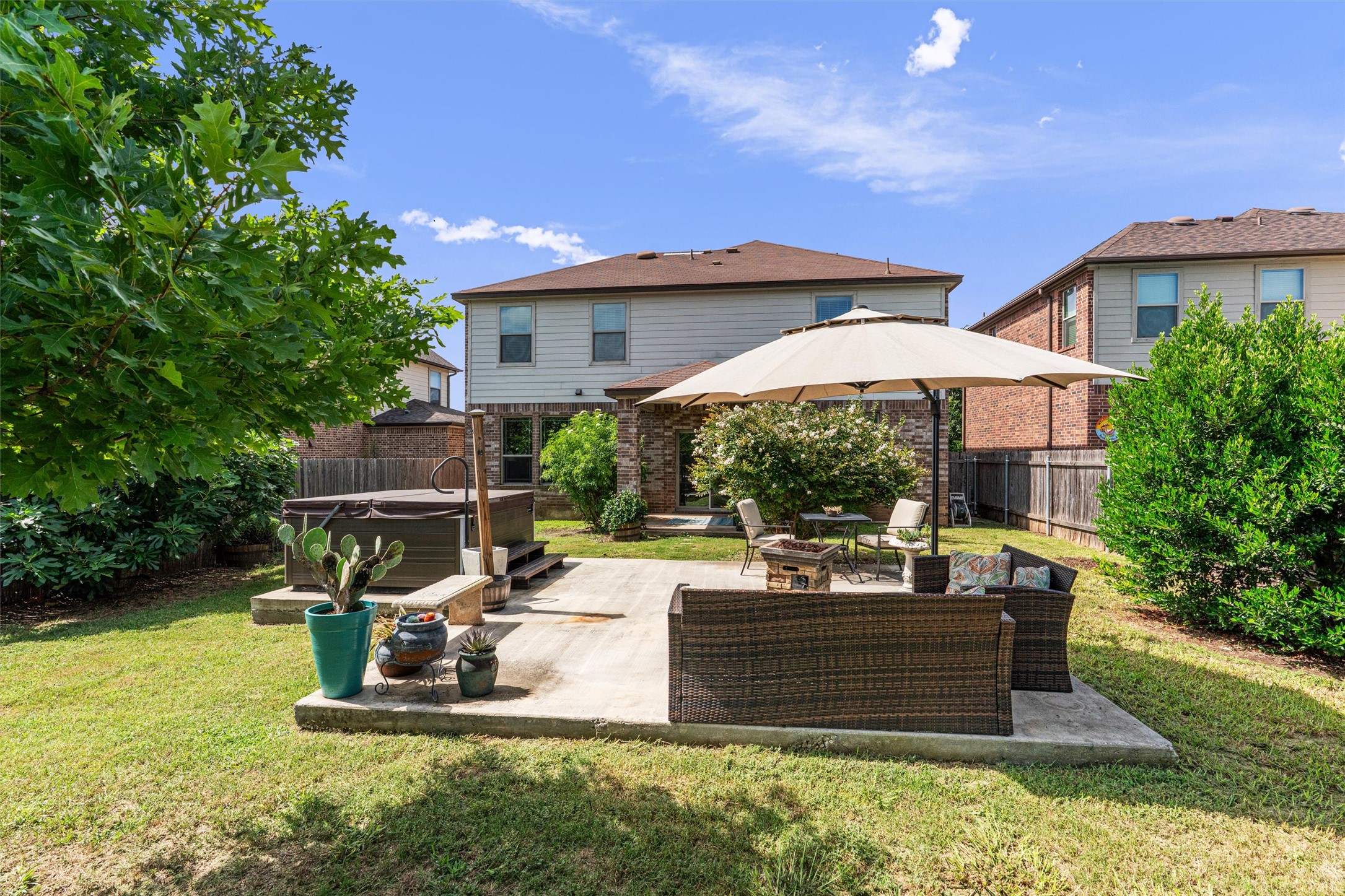 804 Water Hyacinth Loop Leander, TX 78641 - Photo 33 of 37 a view of a house with backyard and porch