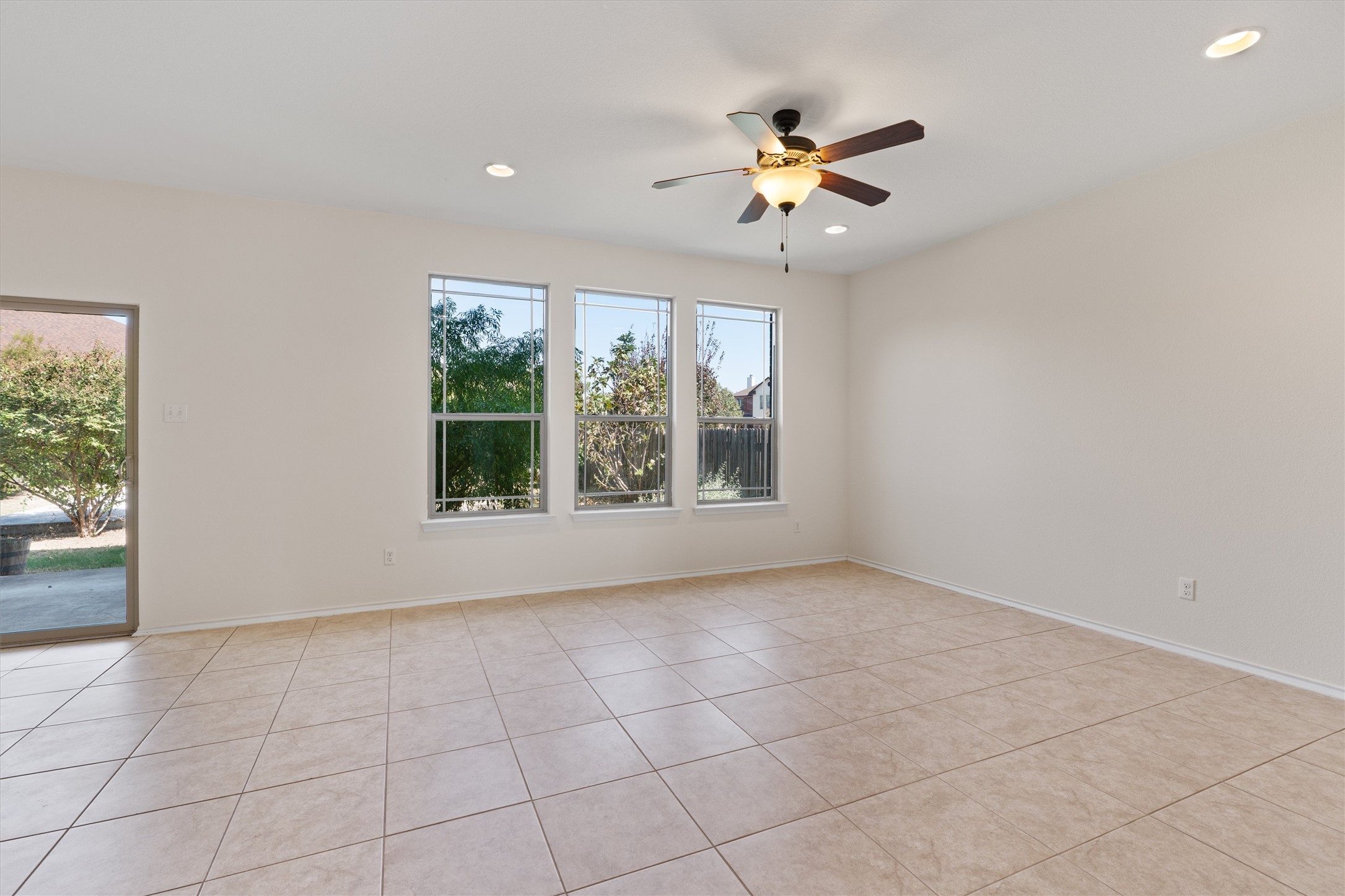 804 Water Hyacinth Loop Leander, TX 78641 - Photo 5 of 37 a view of an empty room with a window