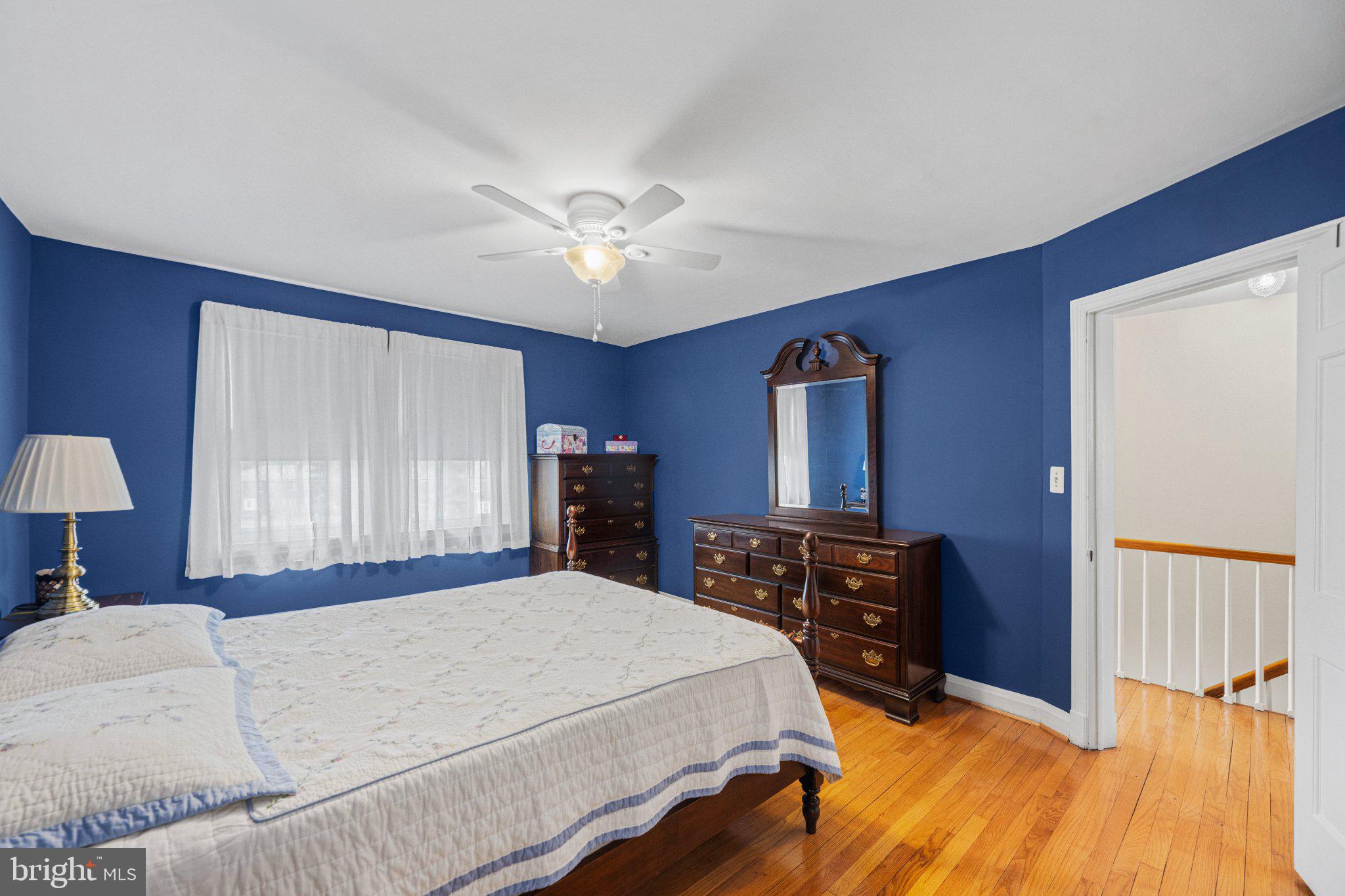 406 Greenlow Road Baltimore, MD 21228 - Photo 16 of 31 Charming blue-hued bedroom retreat.