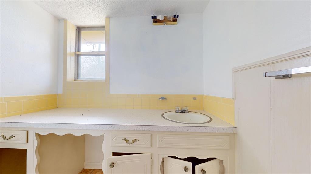 2309 Terrell Road Greenville, TX 75402 - Photo 22 of 30 a view of kitchen with furniture and window