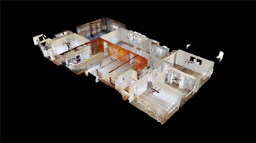 2309 Terrell Road Greenville, TX 75402 - Photo 30 of 30 a white bed sitting in a bedroom next to a tv