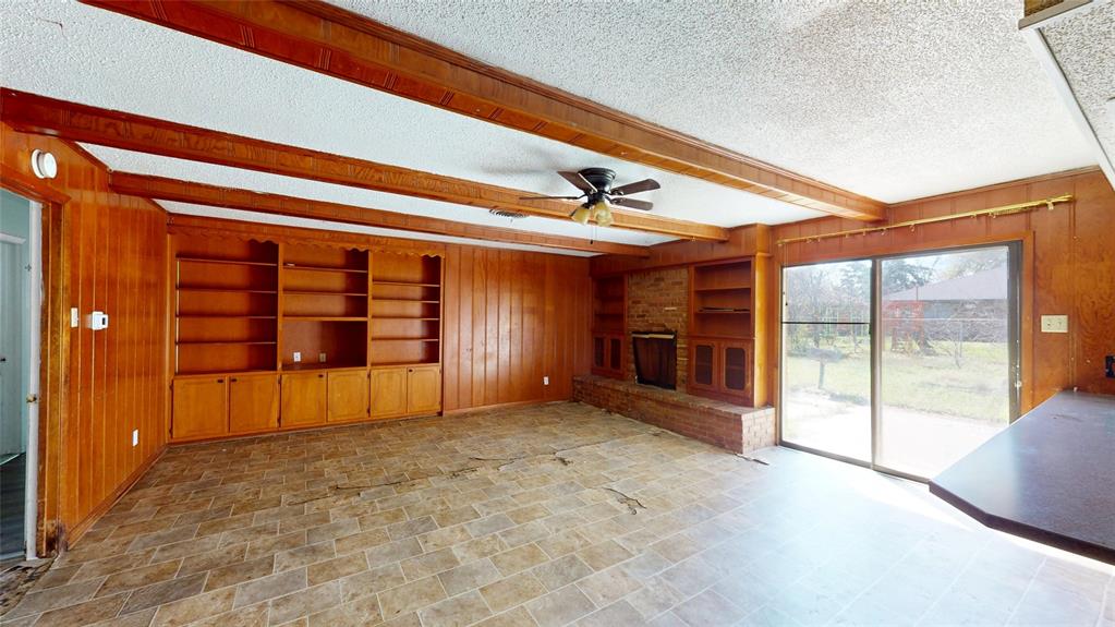 2309 Terrell Road Greenville, TX 75402 - Photo 5 of 30 a view of a livingroom with a staircase