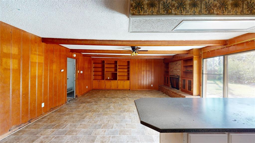 2309 Terrell Road Greenville, TX 75402 - Photo 7 of 30 wooden floor in an empty room
