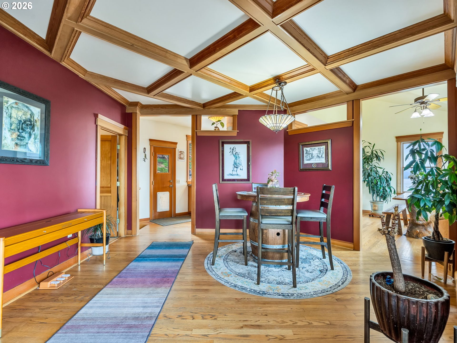 409 2nd Street Astoria, OR 97103 - Photo 17 of 45 a view of a dining room with furniture window and wooden floor