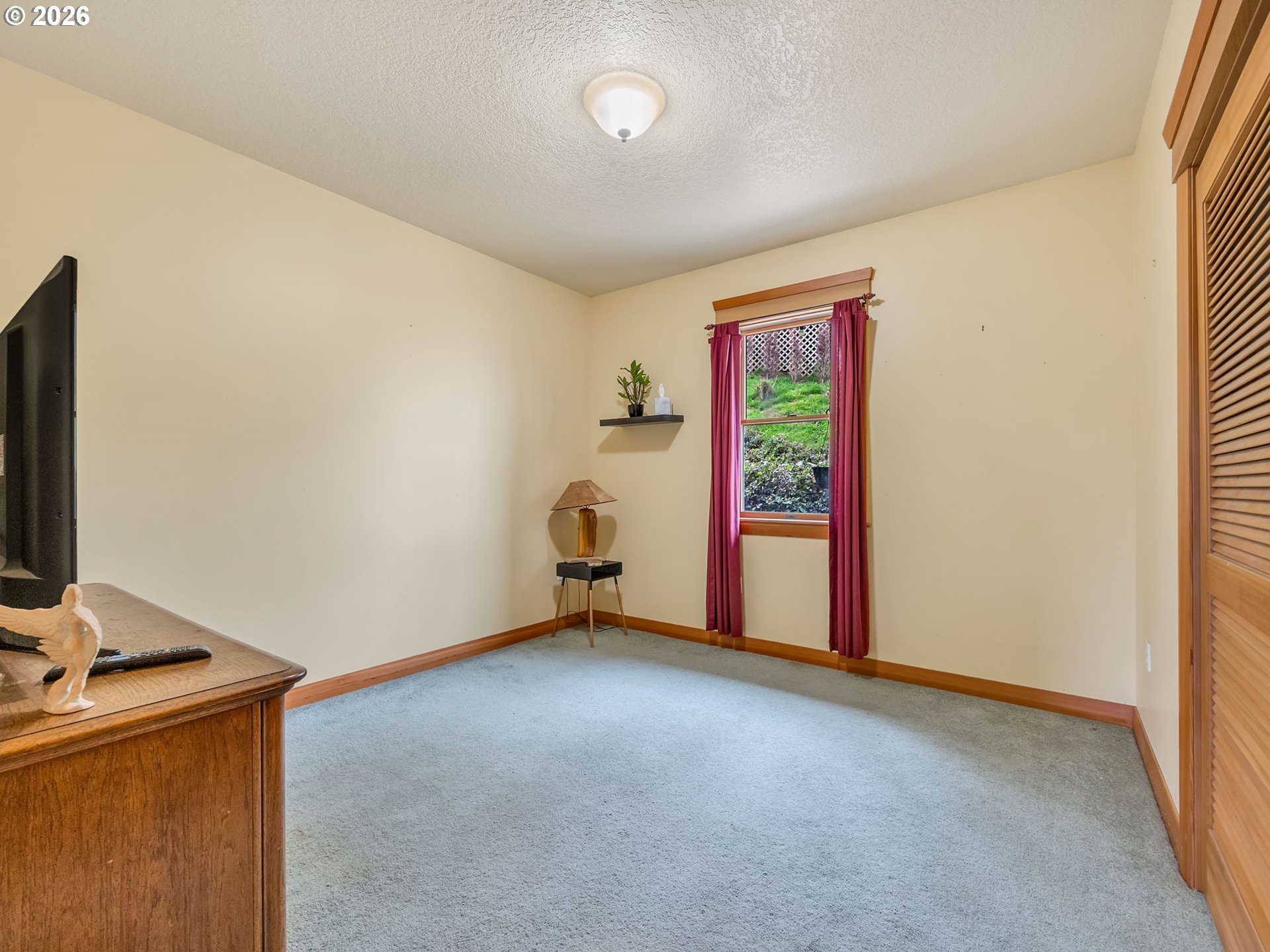 409 2nd Street Astoria, OR 97103 - Photo 26 of 45 an empty room with windows