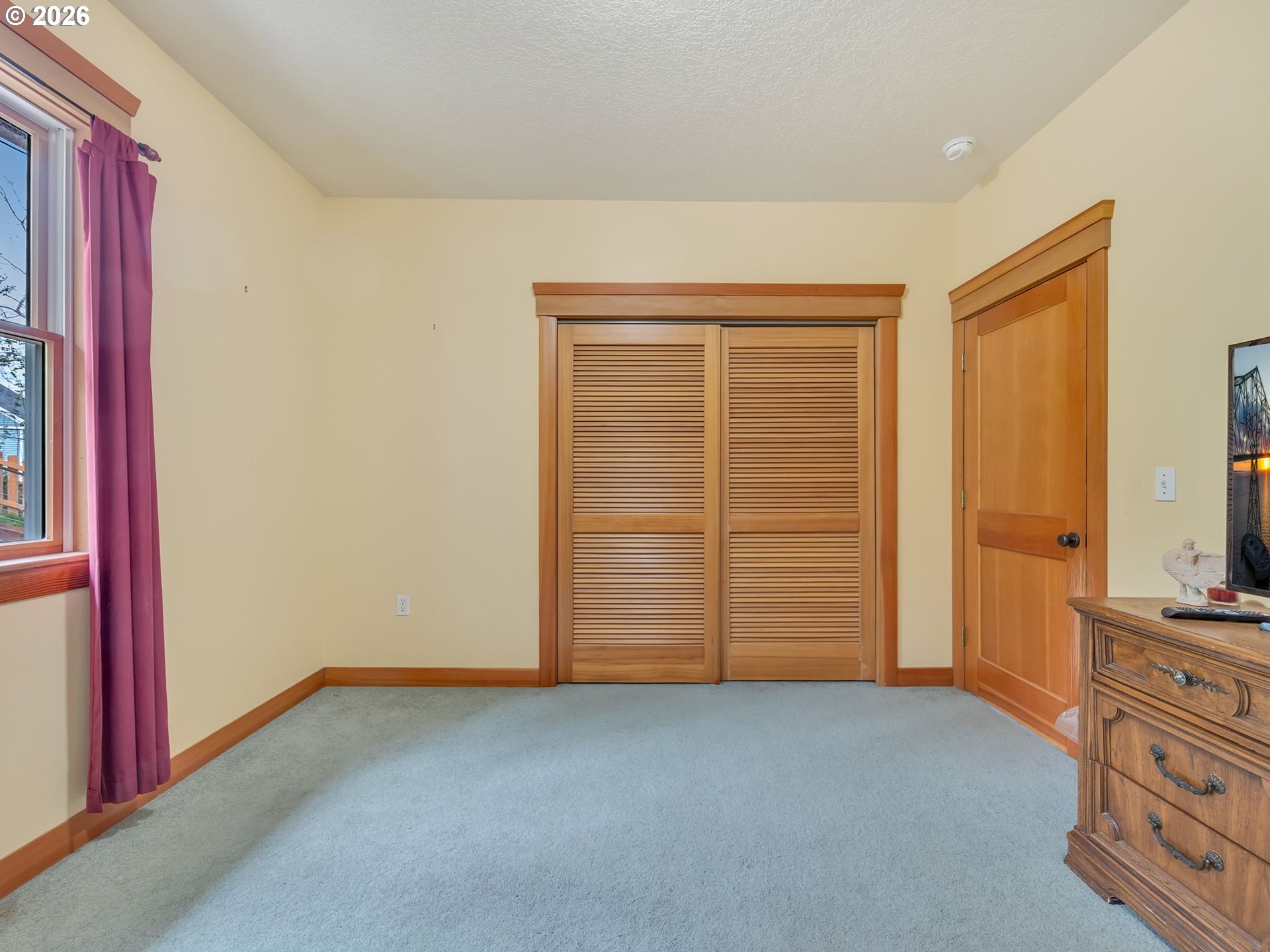 409 2nd Street Astoria, OR 97103 - Photo 27 of 45 a view of an empty room with a cabinet