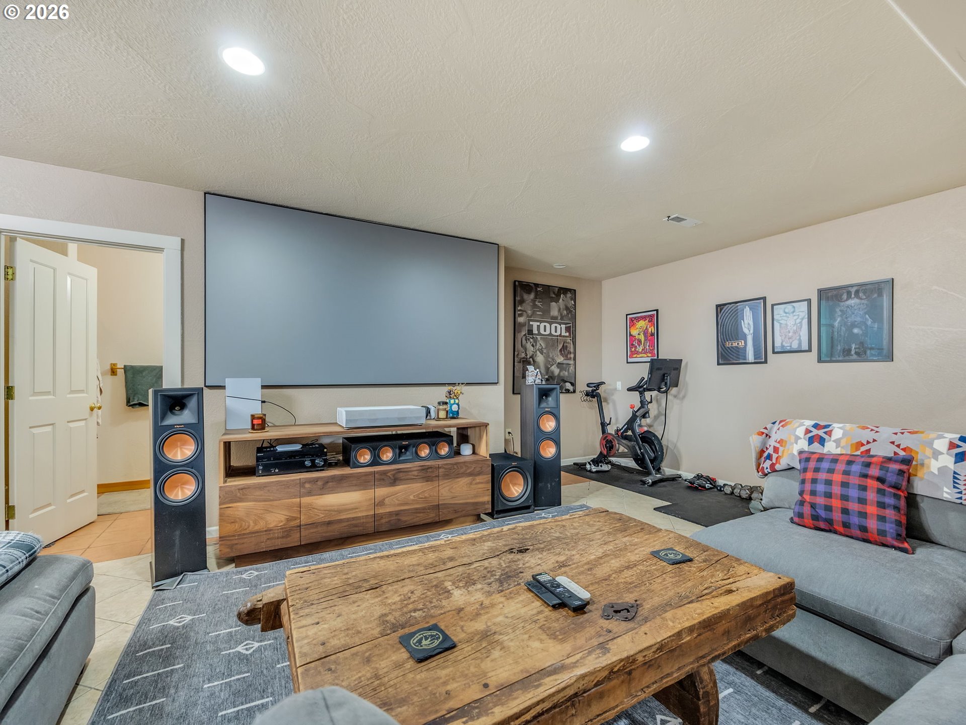 409 2nd Street Astoria, OR 97103 - Photo 31 of 45 a living room with furniture and a flat screen tv