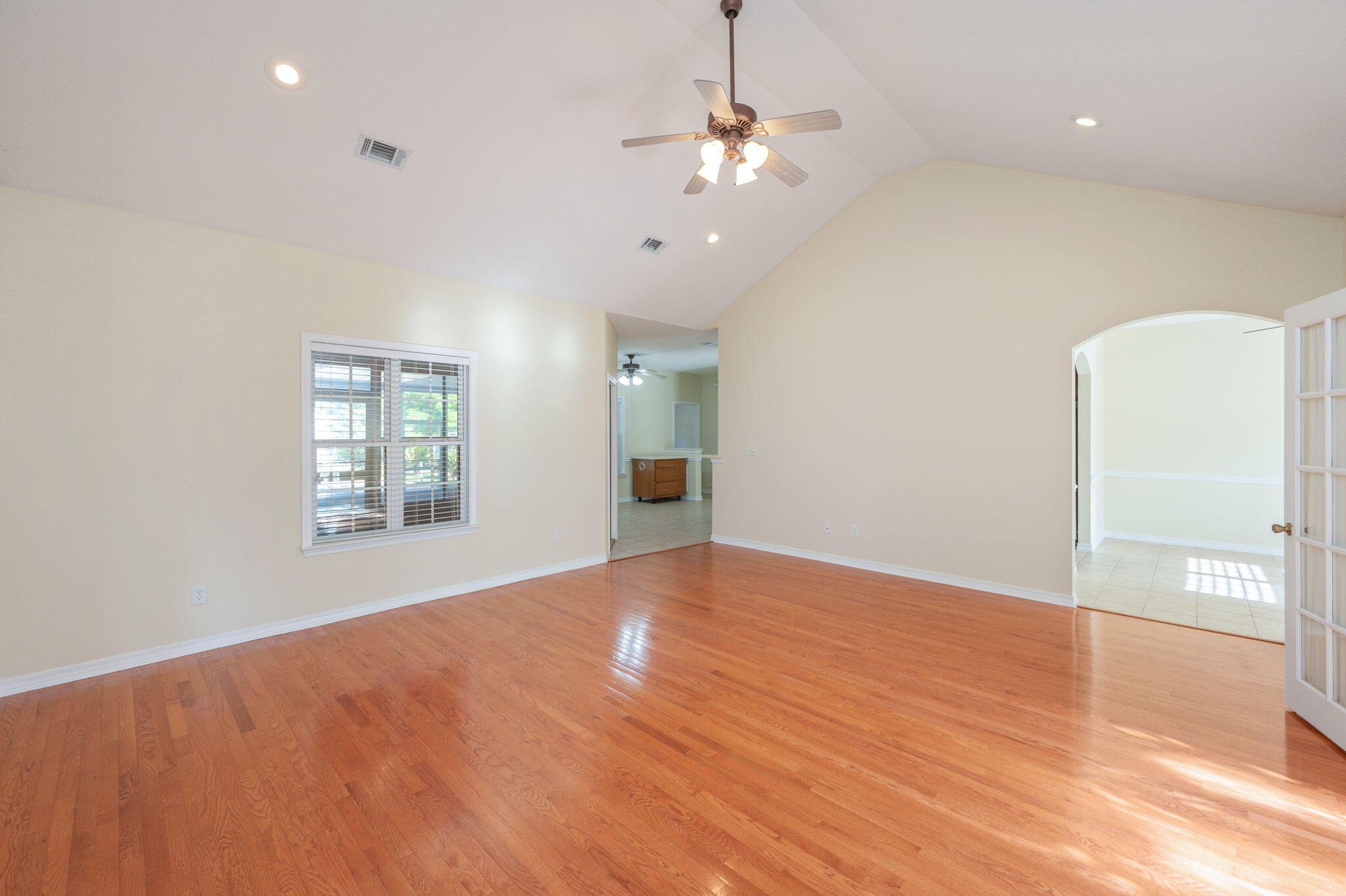 5552 Frontier Drive Crestview, FL 32536 - Photo 11 of 50 wooden floor in an empty room with a window