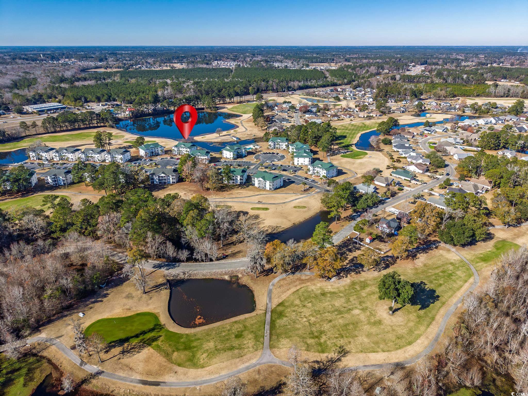 673 Tupelo Lane, Unit 19H Longs, SC 29568 - Photo 17 of 22 View of property location with a nearby body of water and a golf club