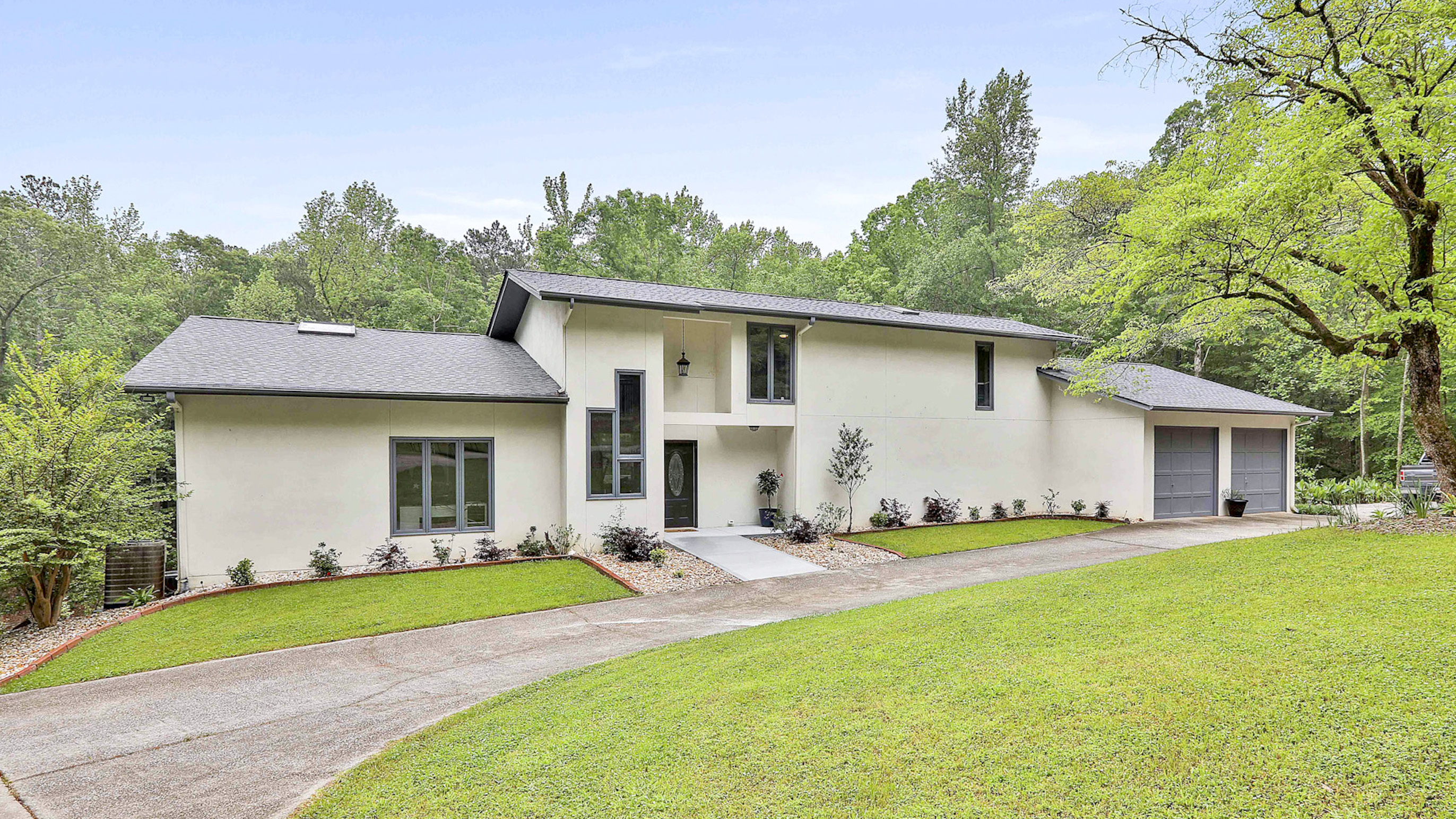 160 Bridger Point Road Fayetteville, GA 30215 - Photo 1 of 1 a front view of house with yard and green space