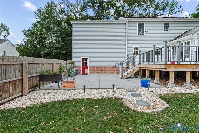 a view of house with outdoor space and sitting area