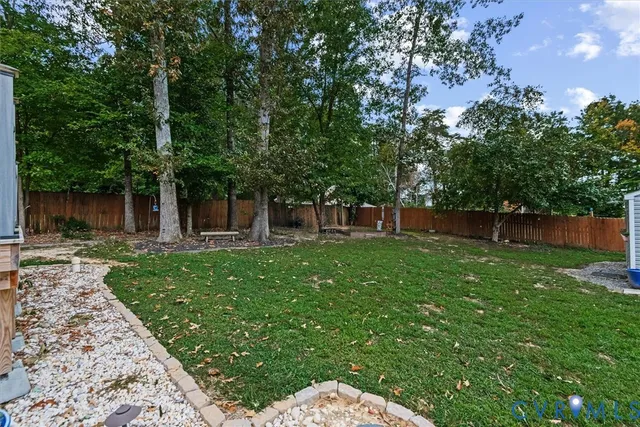 a view of a backyard with a garden