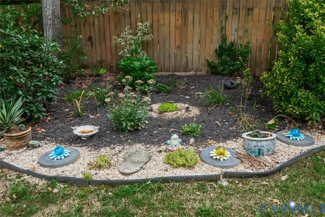 a view of a table and chairs in back yard