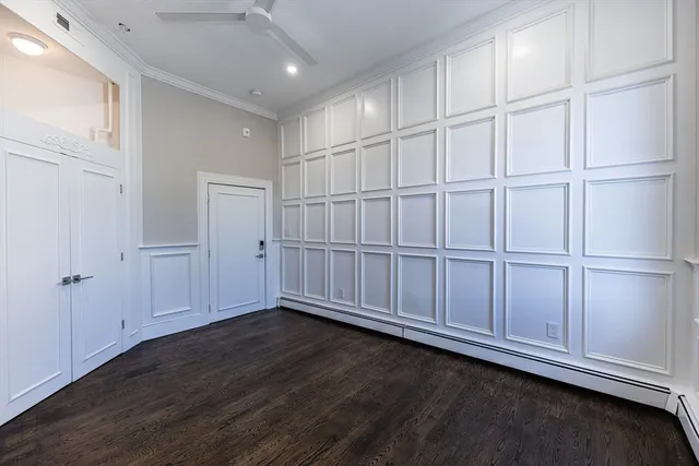 a view of a livingroom with wooden floor