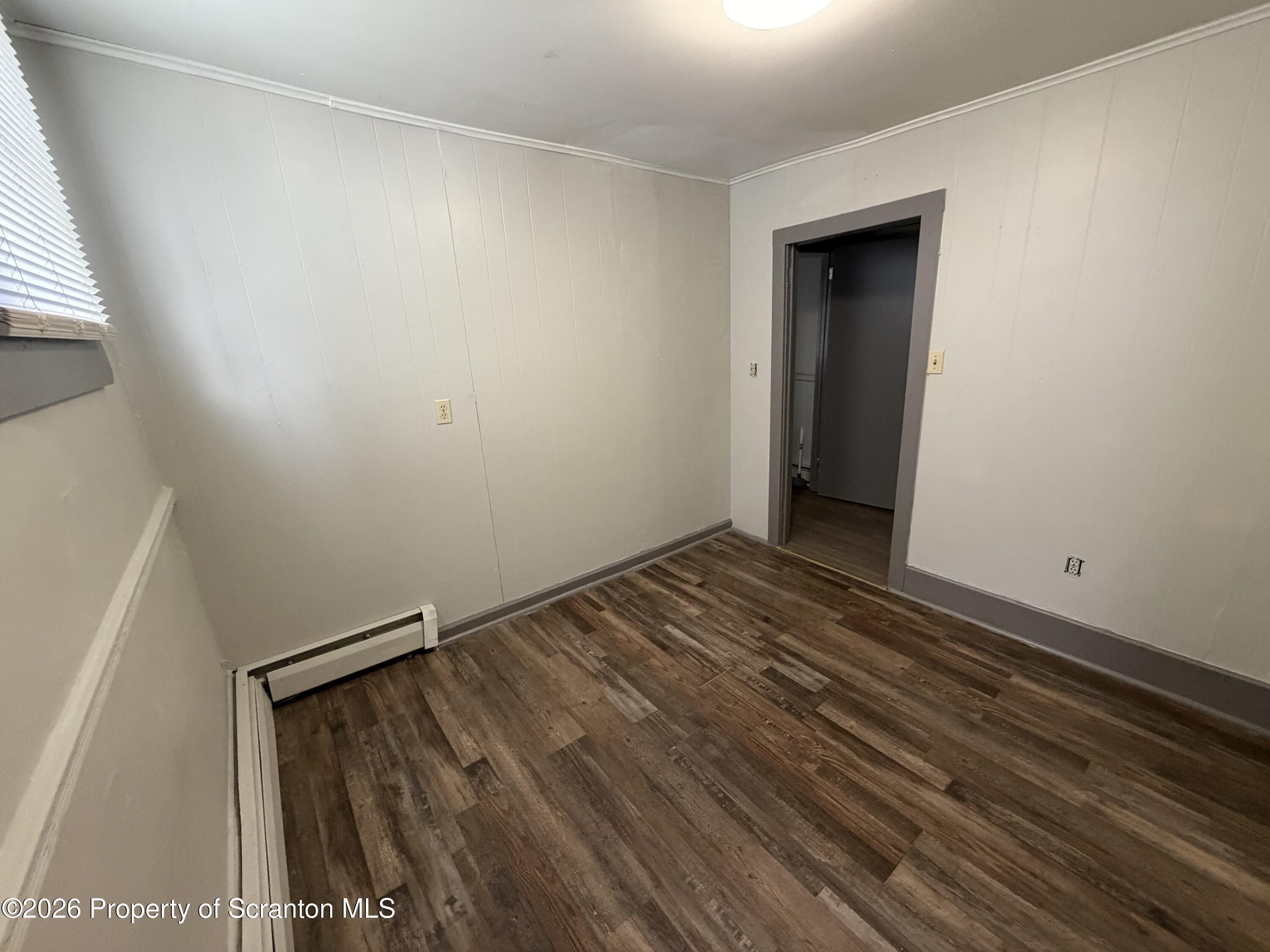 130 State Street, Unit 1 Nanticoke, PA 18634 - Photo 4 of 7 a view of room with wooden floor