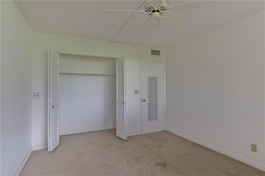 167 Grantham East, Unit 167 Deerfield Beach, FL 33442 - Photo 11 of 20 a view of an empty room