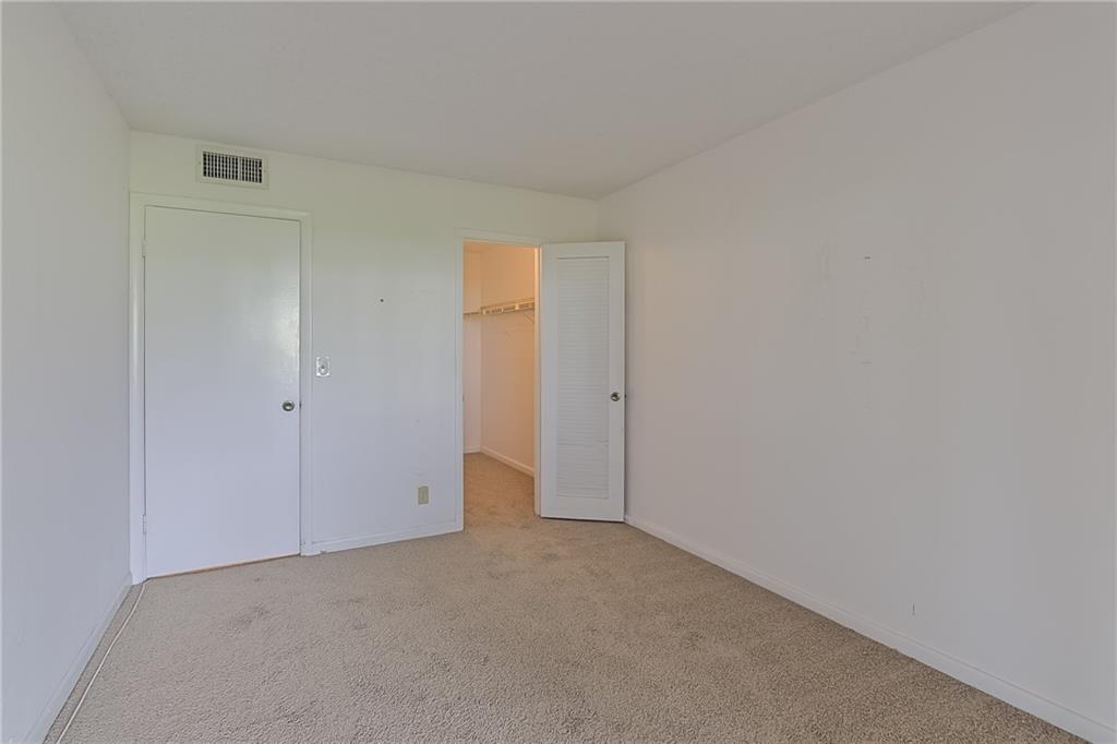 167 Grantham East, Unit 167 Deerfield Beach, FL 33442 - Photo 13 of 20 a view of an empty room