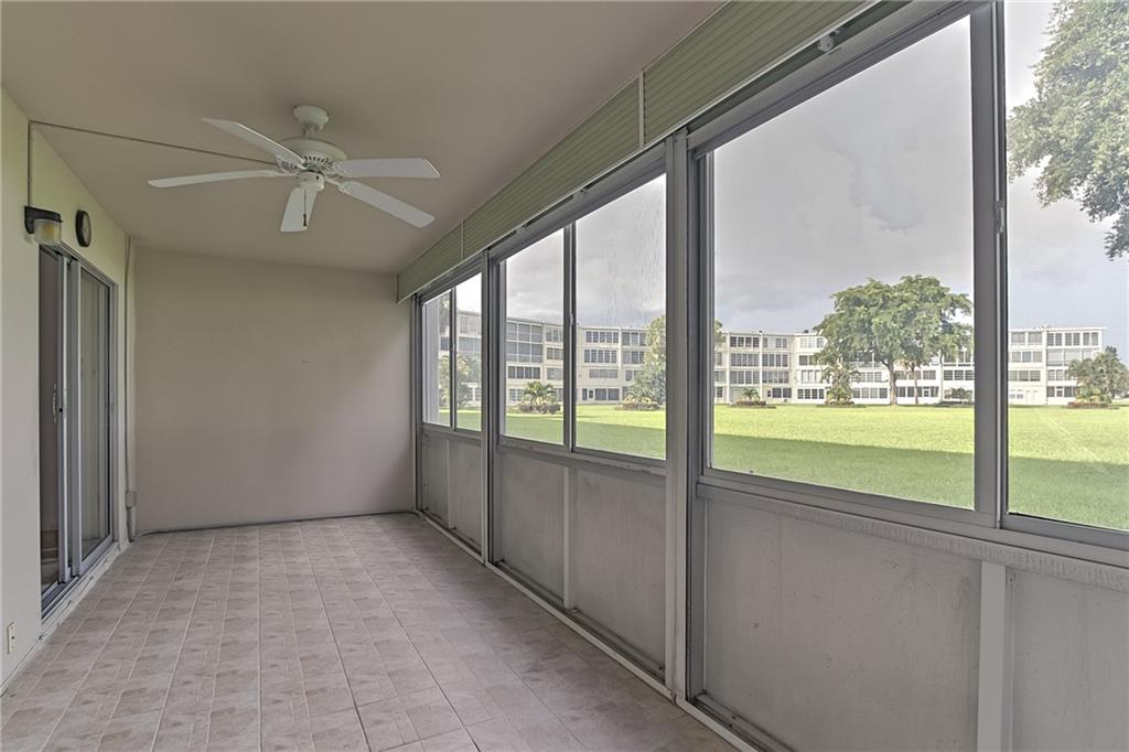 167 Grantham East, Unit 167 Deerfield Beach, FL 33442 - Photo 18 of 20 a view of an empty room and window