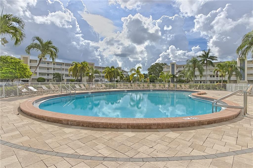 167 Grantham East, Unit 167 Deerfield Beach, FL 33442 - Photo 19 of 20 a view of a swimming pool