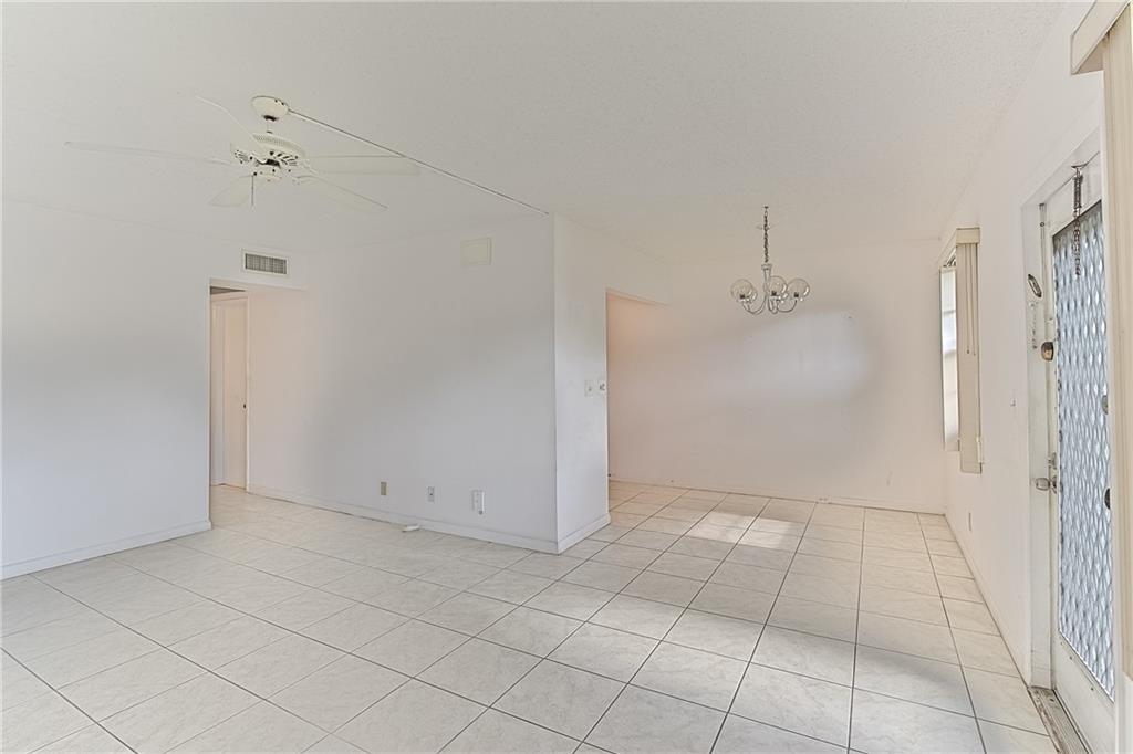 167 Grantham East, Unit 167 Deerfield Beach, FL 33442 - Photo 3 of 20 a view of an empty room