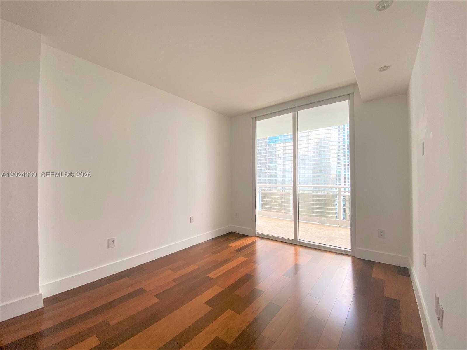 901 Brickell Key Boulevard, Unit 2006 Miami, FL 33131 - Photo 27 of 41 Bedroom 2 - Natural Light
