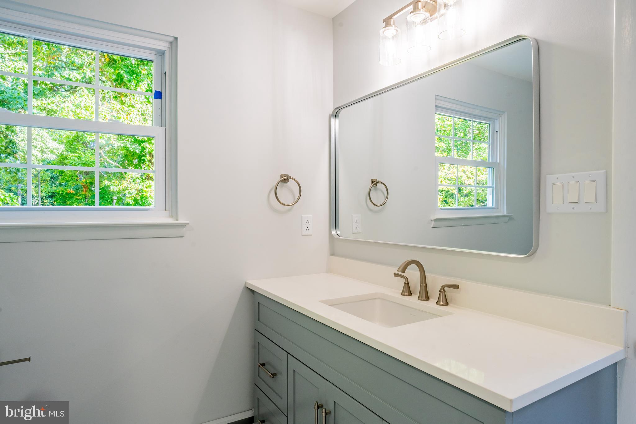 1428 Valley Forge Road Norristown, PA 19403 - Photo 15 of 24 a bathroom with a sink and a window