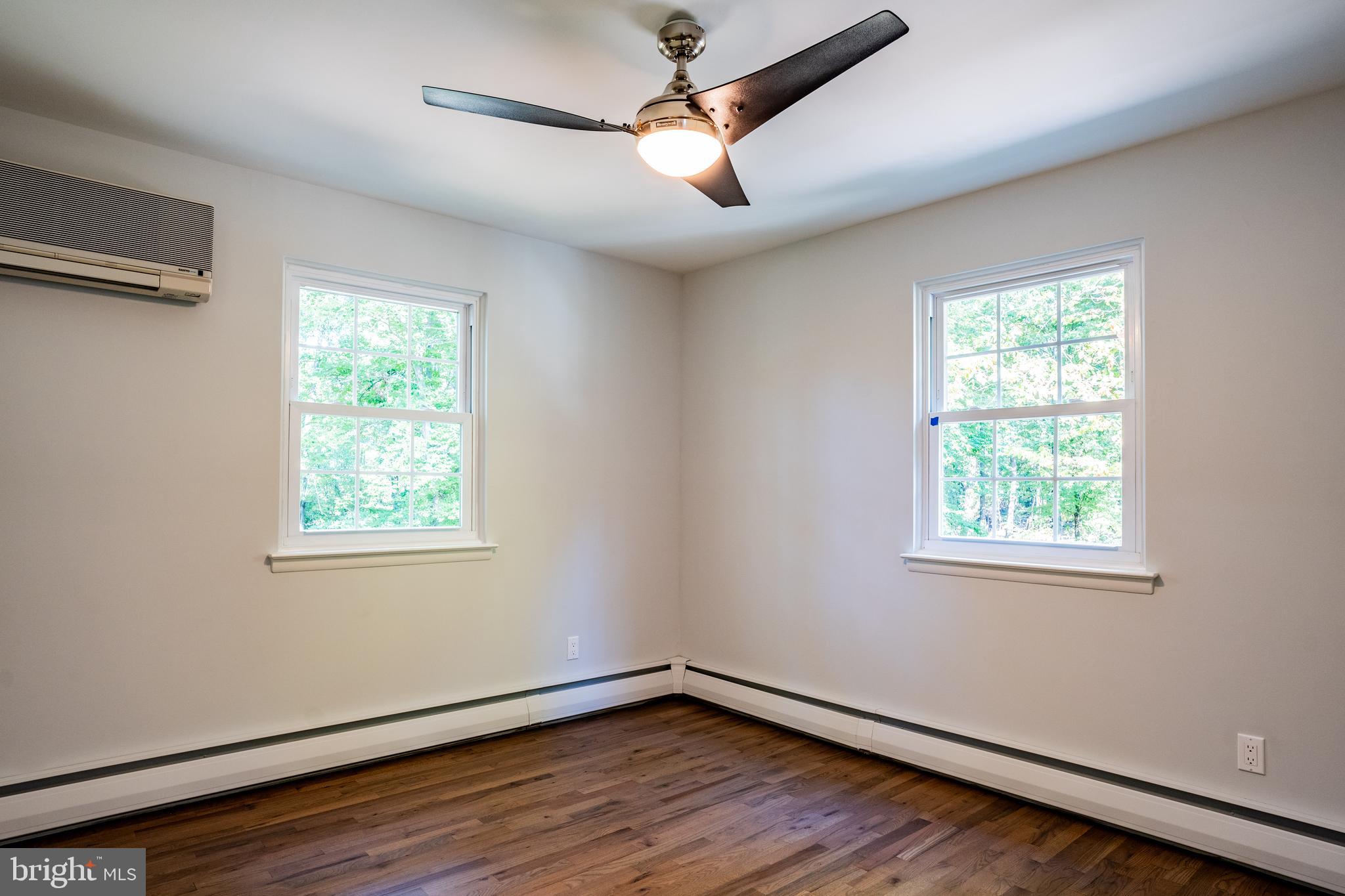 1428 Valley Forge Road Norristown, PA 19403 - Photo 19 of 24 a view of an empty room with wooden floor and a window