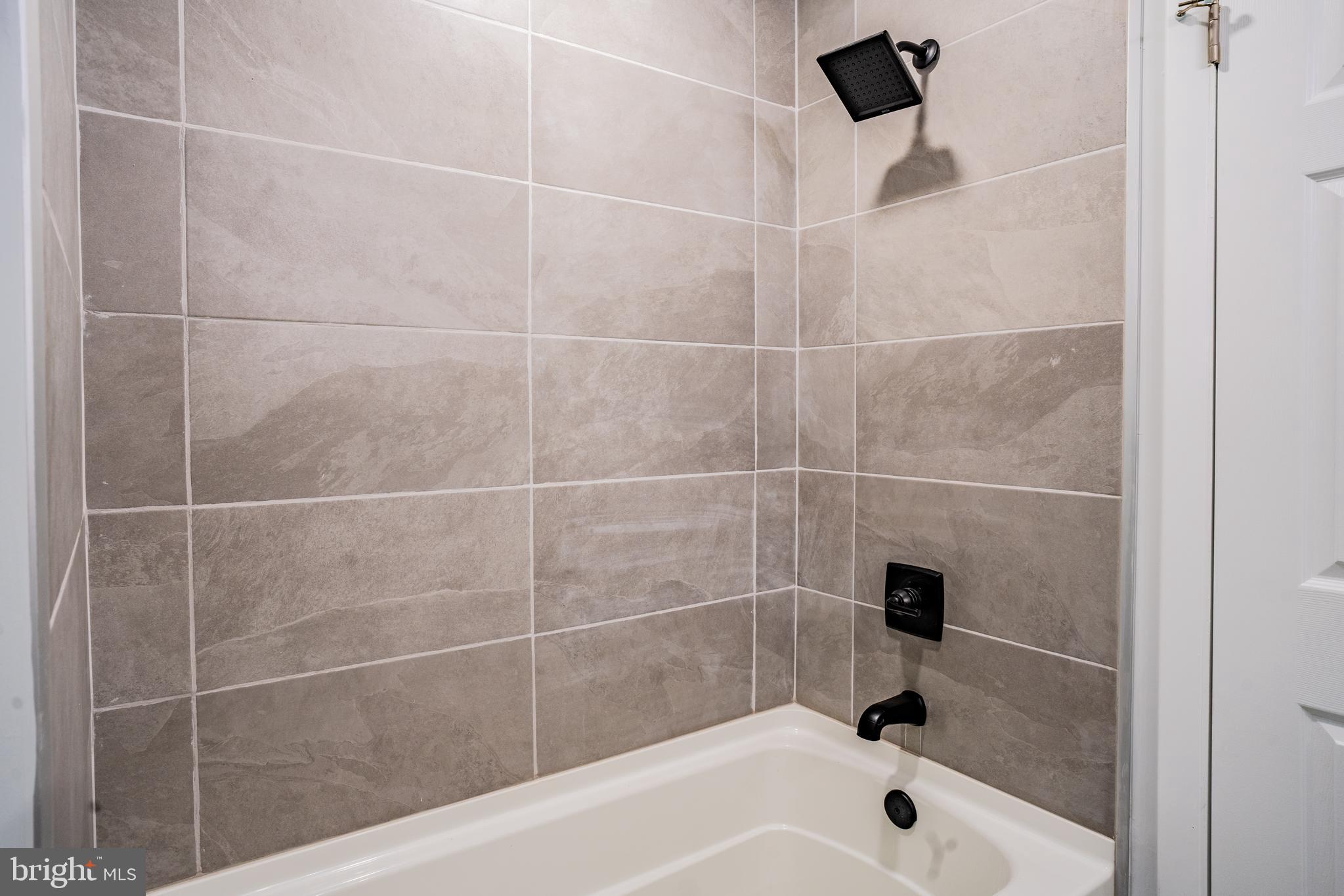 1428 Valley Forge Road Norristown, PA 19403 - Photo 22 of 24 a bathroom with a bathtub and a shower