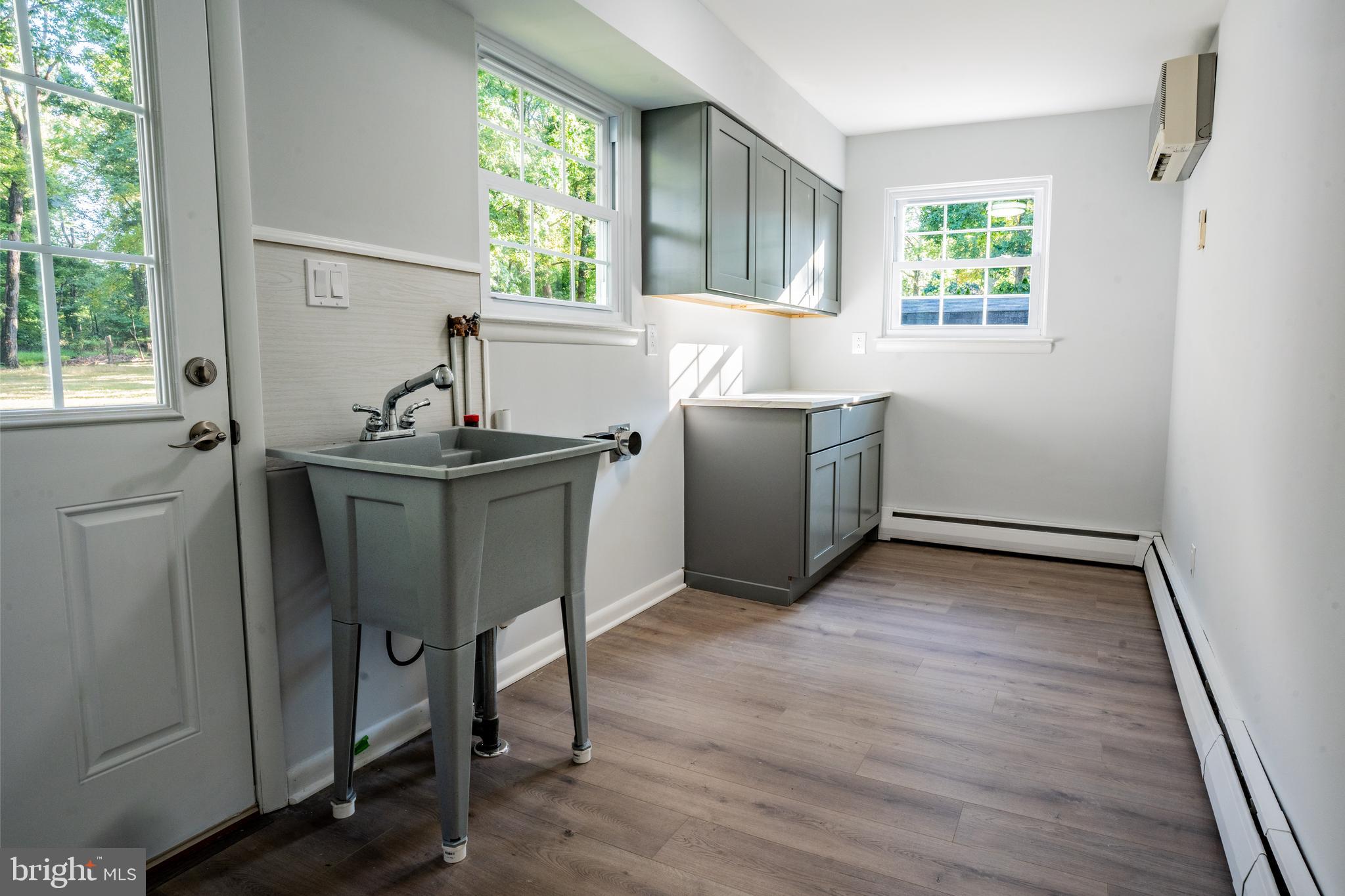 1428 Valley Forge Road Norristown, PA 19403 - Photo 23 of 24 a workspace with windows and wooden floor