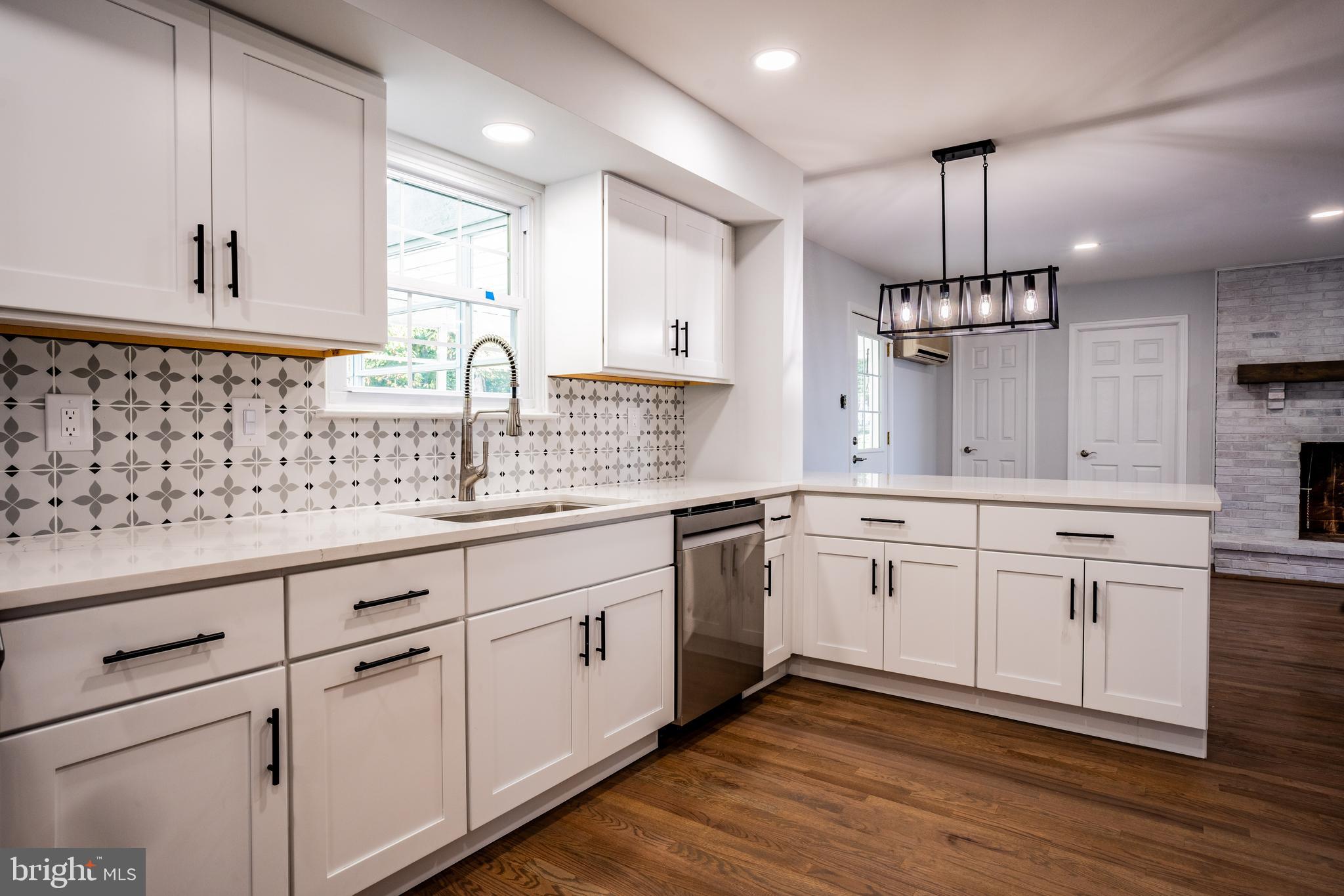 1428 Valley Forge Road Norristown, PA 19403 - Photo 8 of 24 a large kitchen with granite countertop a sink stainless steel appliances and cabinets
