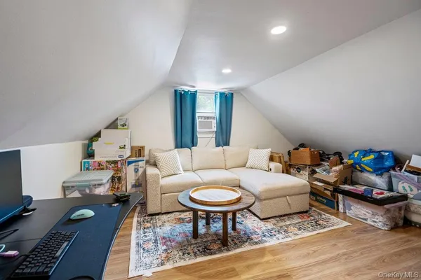 a living room with furniture and a table