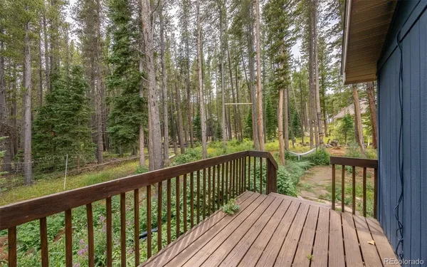 a view of balcony with wooden floor and outdoor space