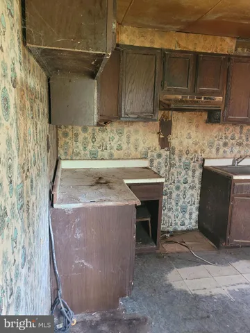 a view of a fireplace in the kitchen