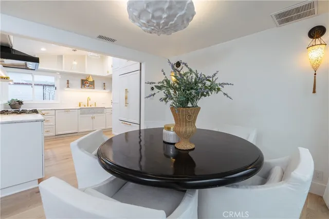 a bedroom with a bed and glass door