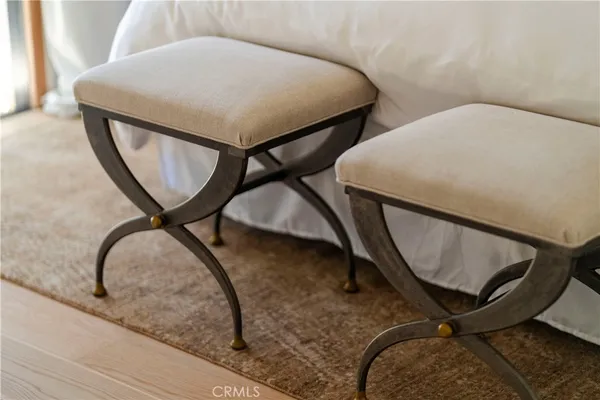 a view of a chairs and table in a patio