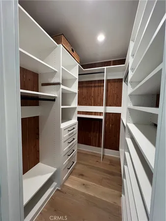 a bathroom with a granite countertop sink mirror and double