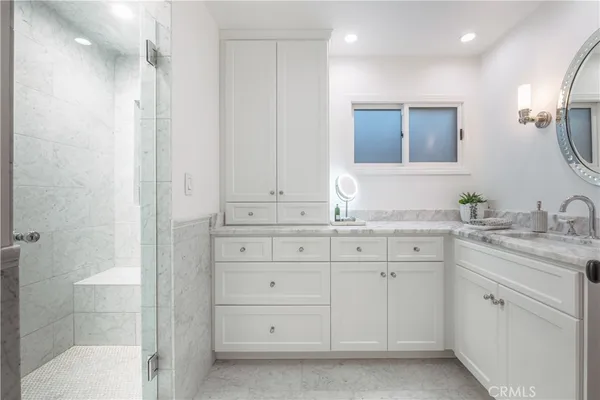 a view of a lake with a house in the background