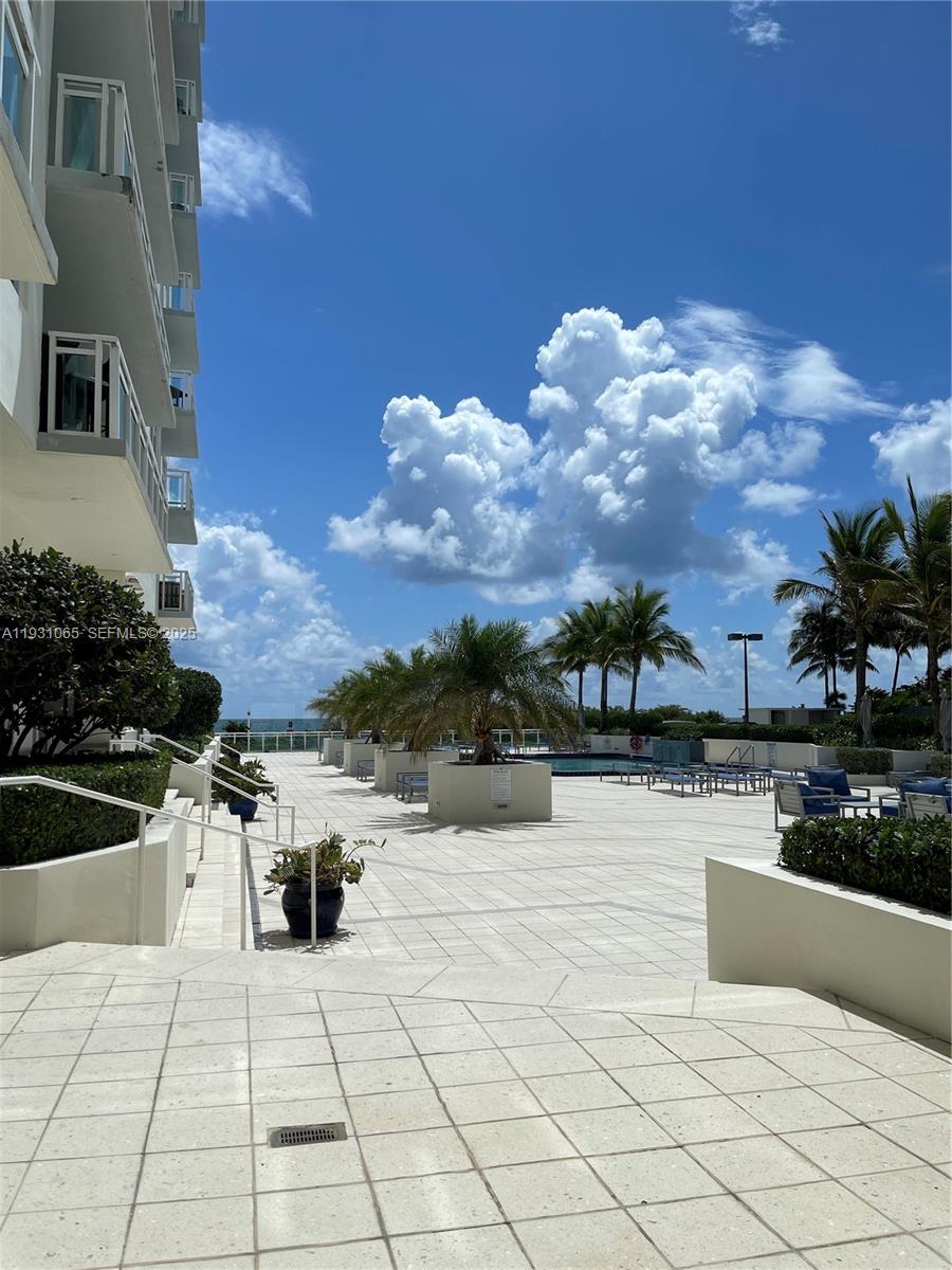 6917 Collins Avenue, Unit 1008 Miami Beach, FL 33141 - Photo 12 of 64 a view of terrace with seating space
