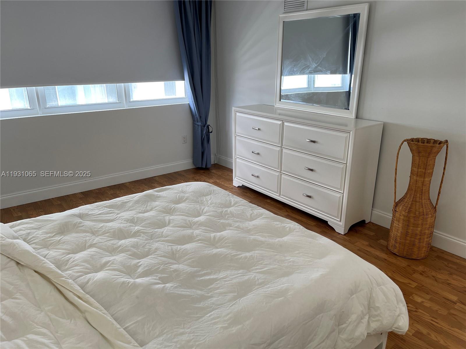 6917 Collins Avenue, Unit 1008 Miami Beach, FL 33141 - Photo 19 of 64 a large white bed in a white room