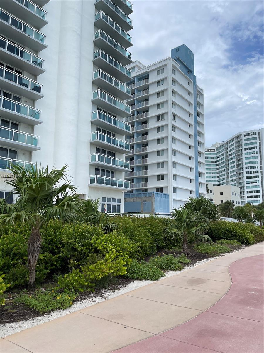6917 Collins Avenue, Unit 1008 Miami Beach, FL 33141 - Photo 28 of 64 a front view of a building
