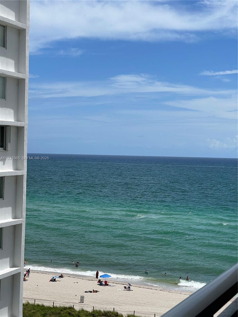 6917 Collins Avenue, Unit 1008 Miami Beach, FL 33141 - Photo 3 of 64 a view of beach with ocean view