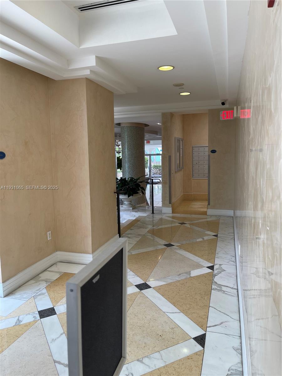 6917 Collins Avenue, Unit 1008 Miami Beach, FL 33141 - Photo 31 of 64 a view of an entryway of a house