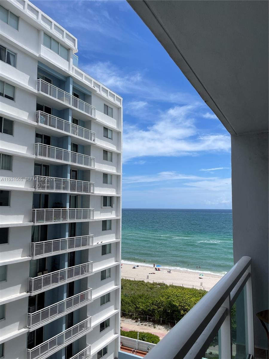 6917 Collins Avenue, Unit 1008 Miami Beach, FL 33141 - Photo 36 of 64 a view of swimming pool from a balcony