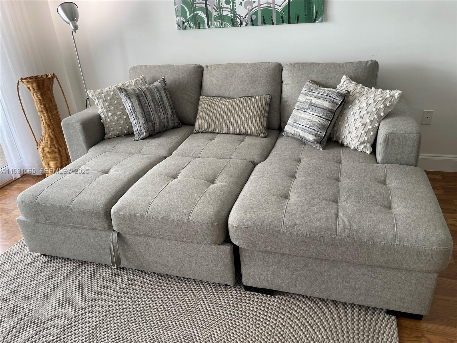 6917 Collins Avenue, Unit 1008 Miami Beach, FL 33141 - Photo 55 of 64 a living room with furniture