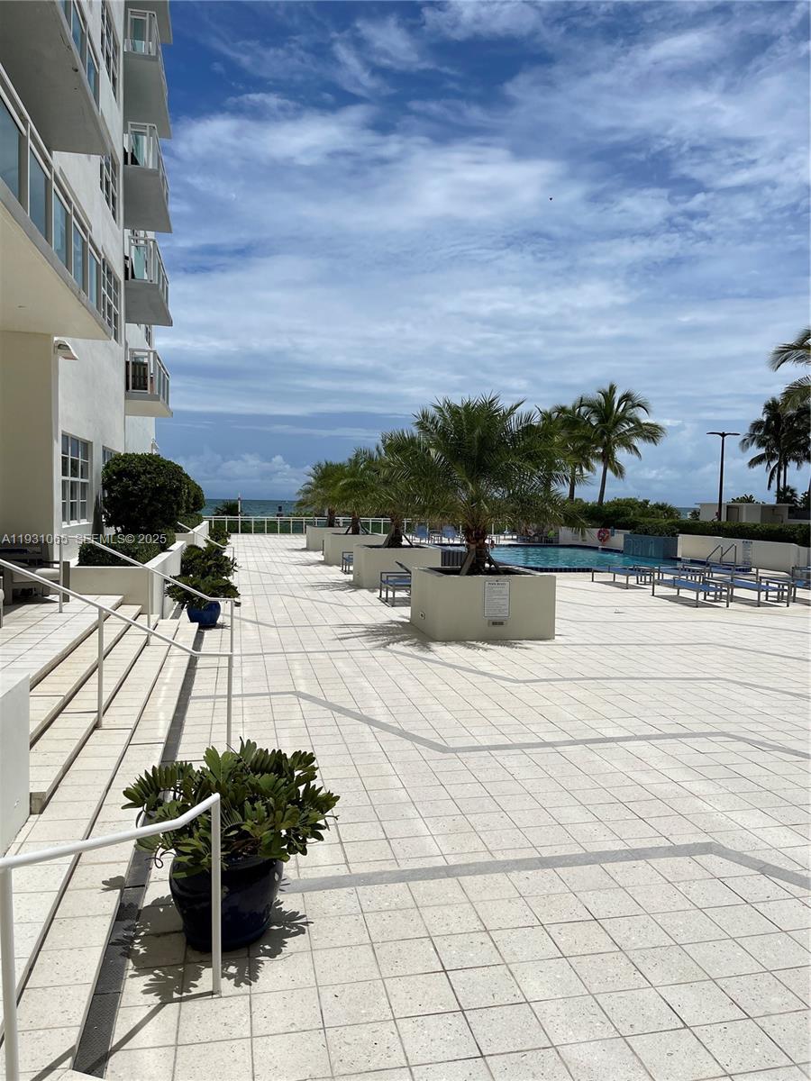 6917 Collins Avenue, Unit 1008 Miami Beach, FL 33141 - Photo 58 of 64 a view of terrace with seating space