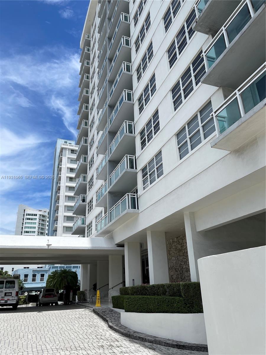 6917 Collins Avenue, Unit 1008 Miami Beach, FL 33141 - Photo 61 of 64 a front view of a building