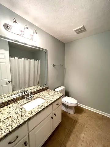 a view of a backyard with a garden