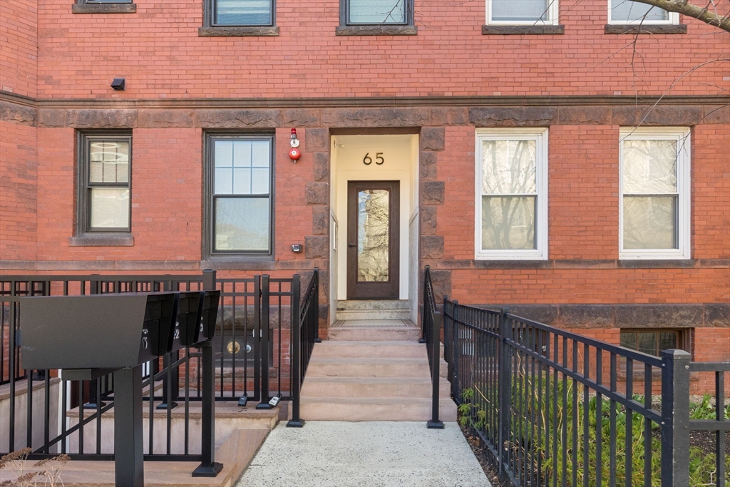a front view of a house with glass door